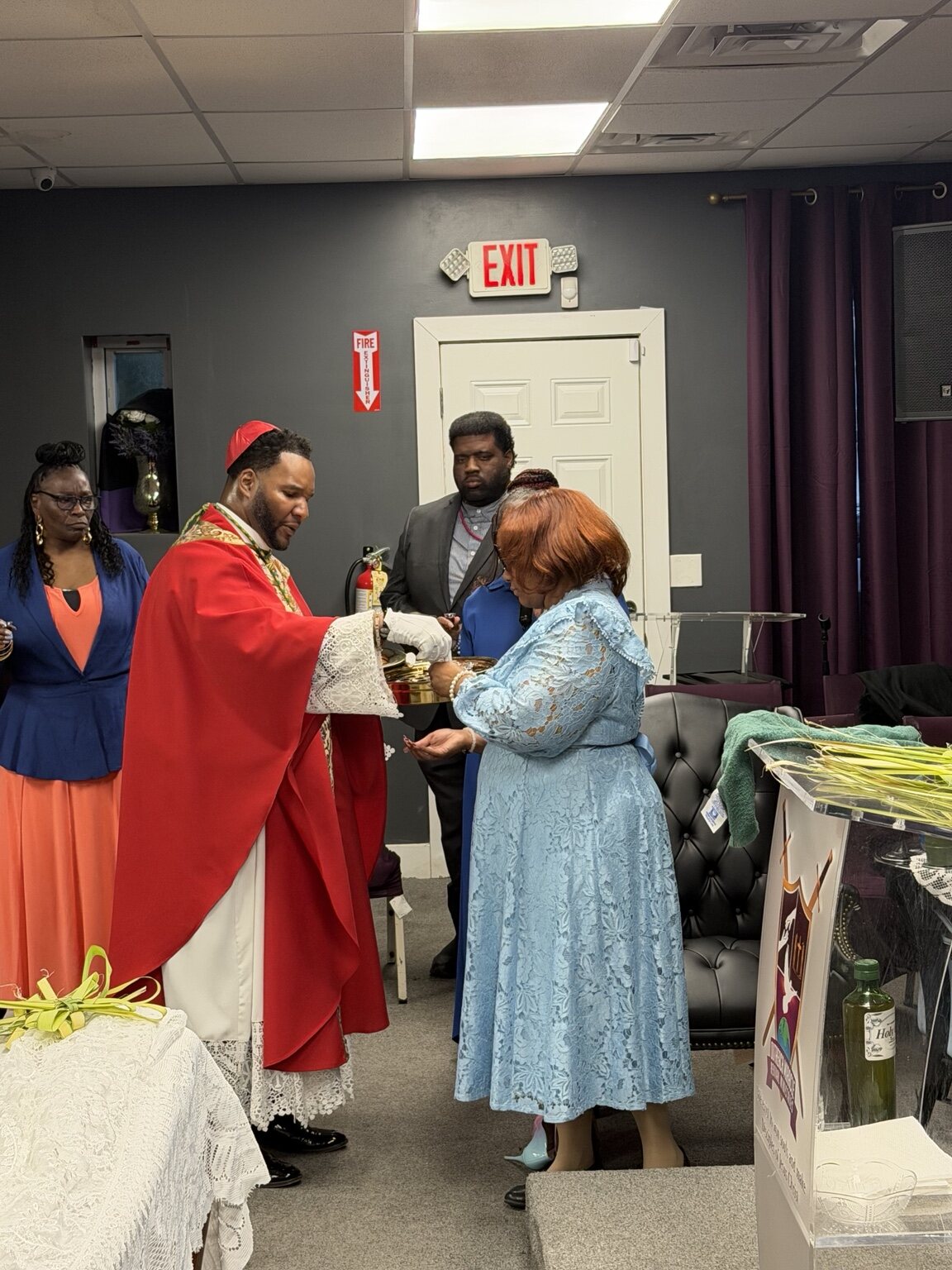 Bishop Brown serving Holy Communion
